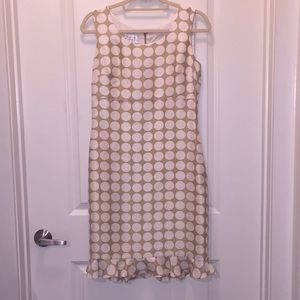 Elegant tan and white polka dotted David Warren.